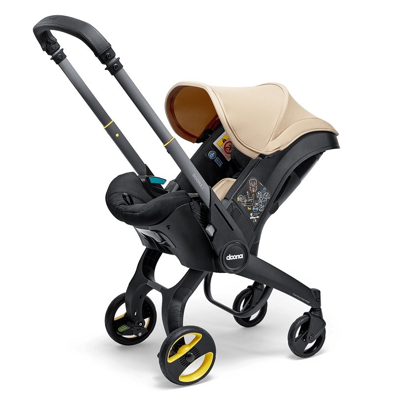 DOONA™ i-size Седалка с шаси 2 в 1, Sahara Sand