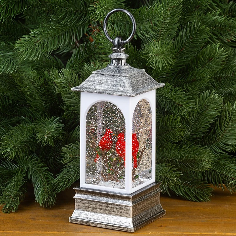 Светещ фенер с бял сняг и птички