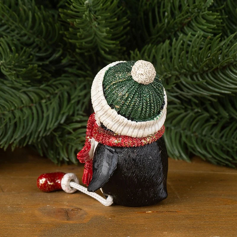 Седящо пингвинче със звездичка